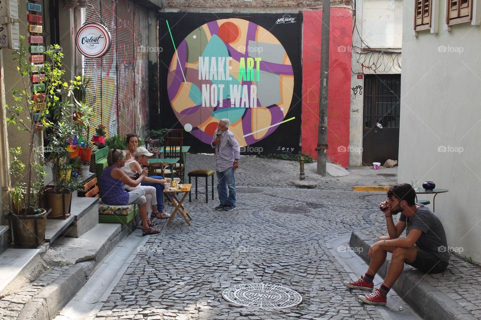 "Make Art, not war" wall sign in Velvet cafe area, somewhere in the old streets of Istanbul.