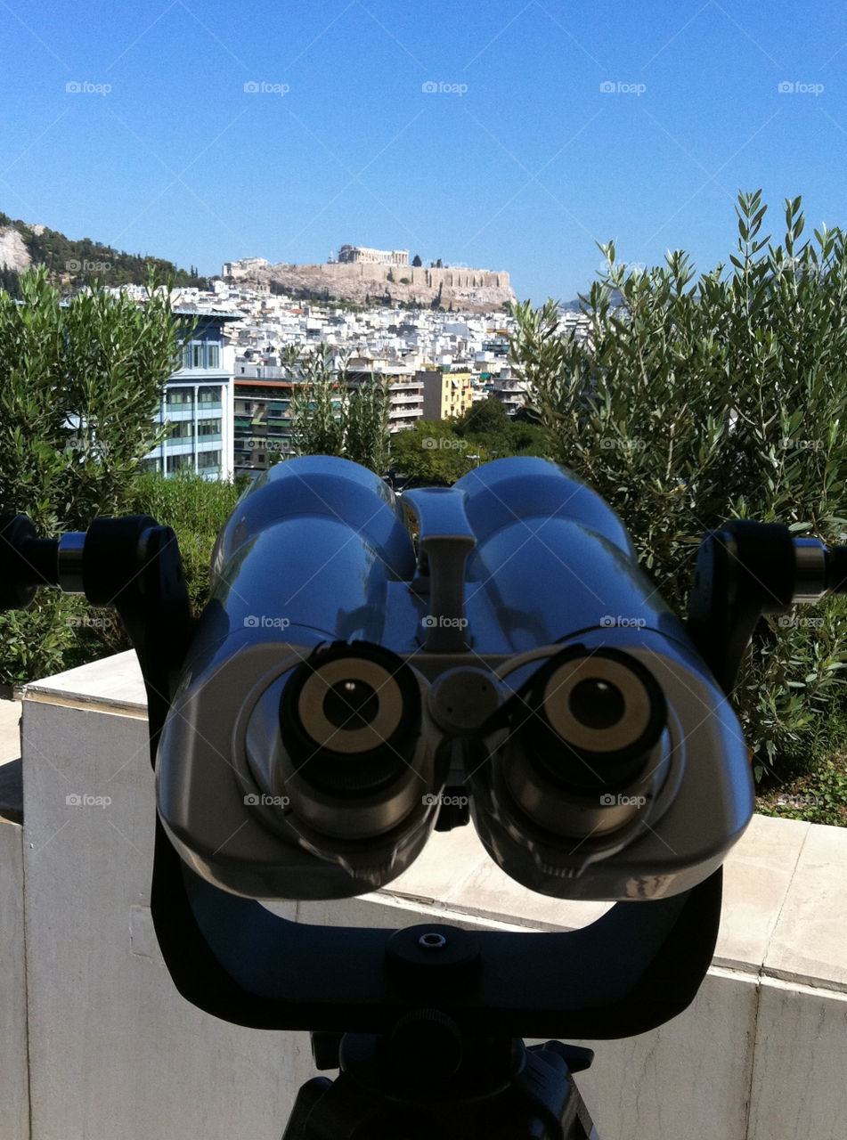 city buildings view binoculars by jeanello