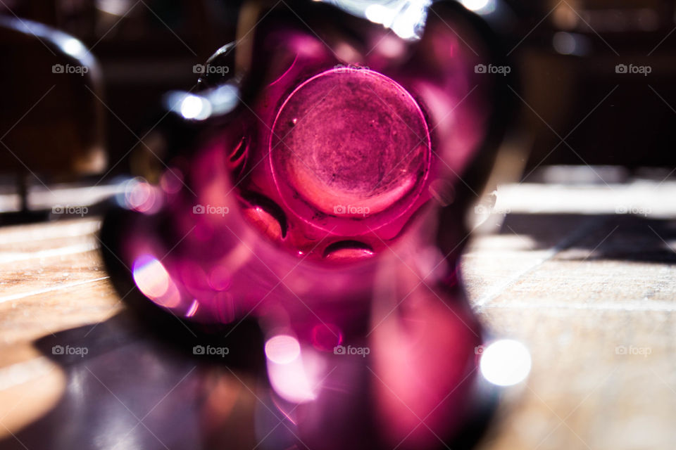 Purple vase in sunlight