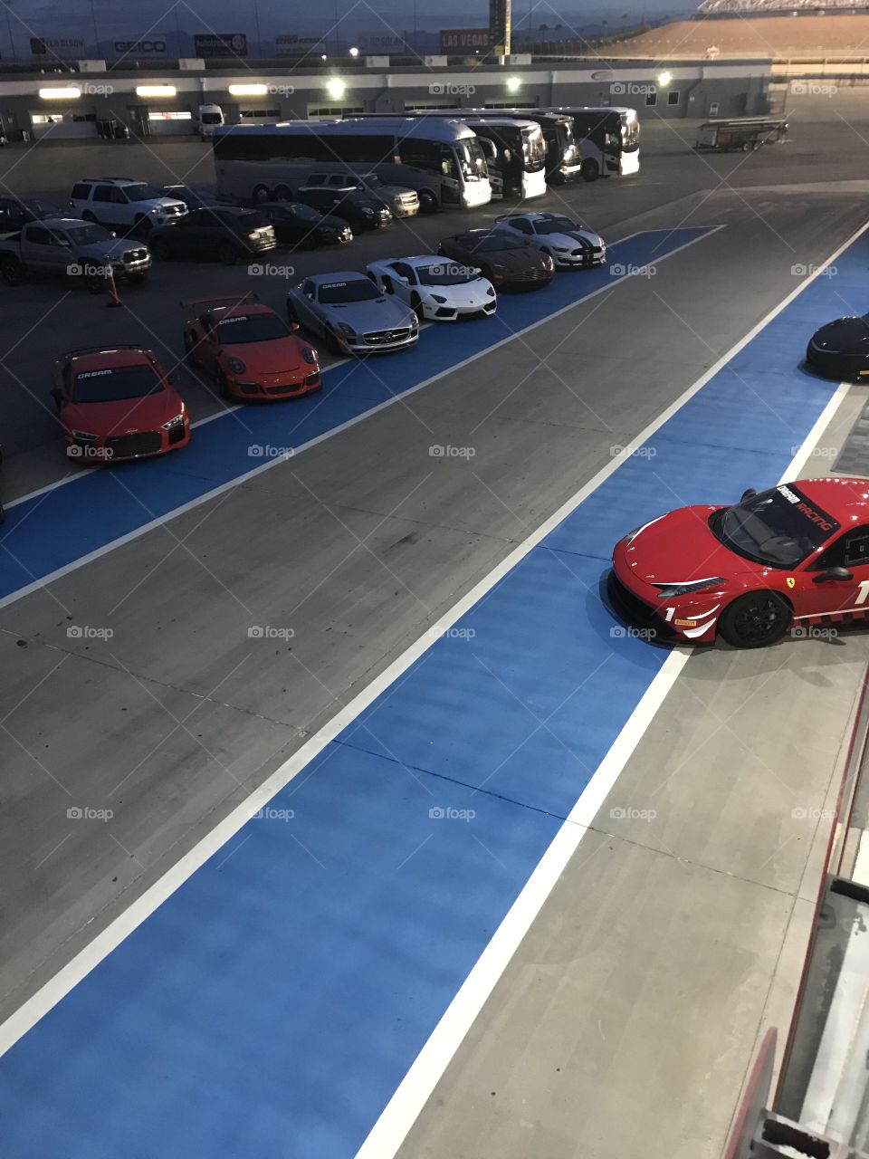 Expensive cars lined up, high angle