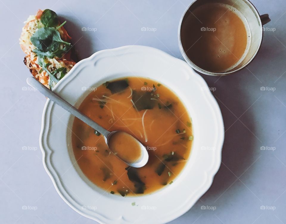 High angle view of soup with sandwich