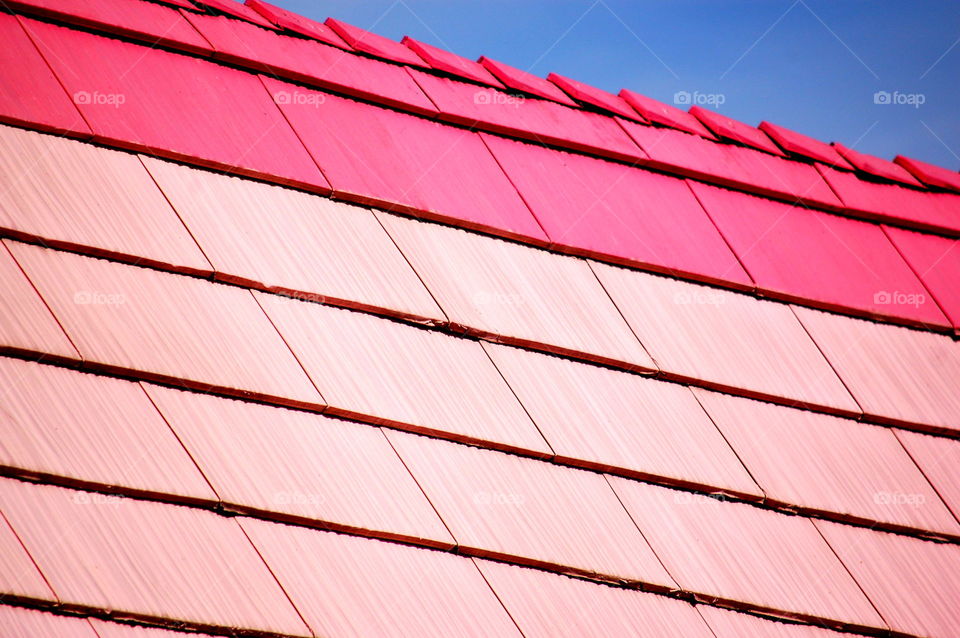 Close-up of pink wooden roof