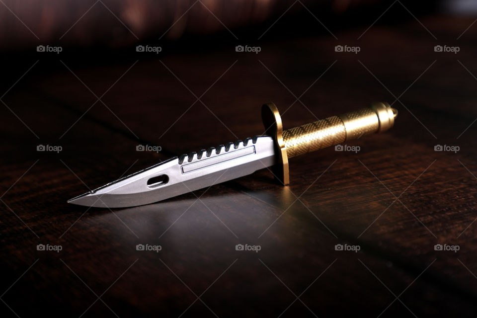 Silver Dagger knife on dark background