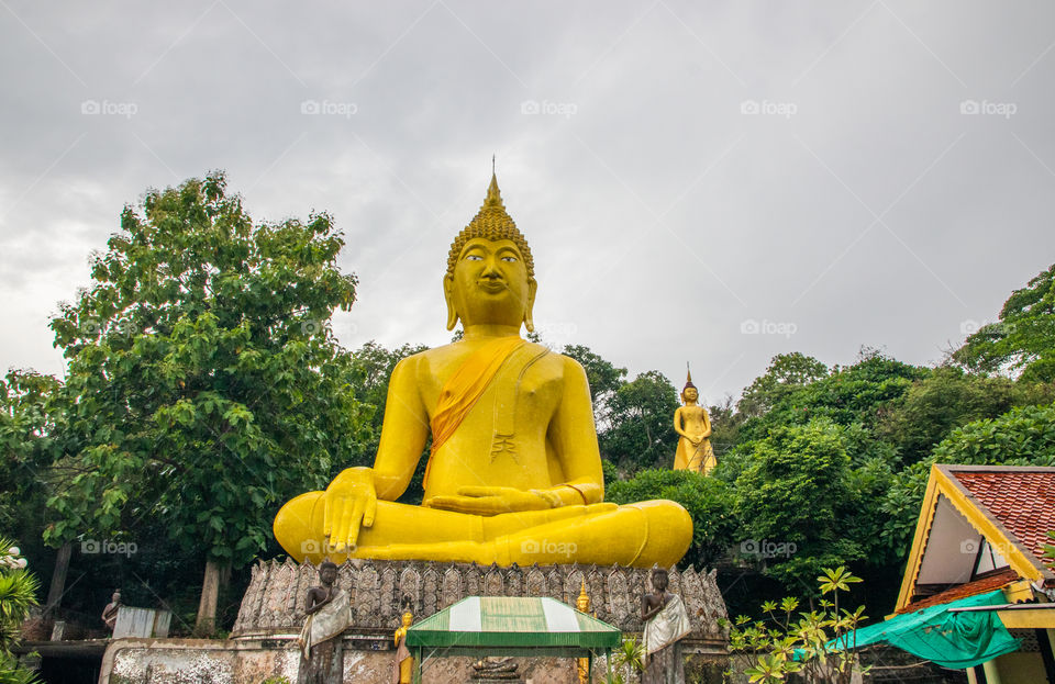 Golden Buddha at the Thai Island Koh Sichang District Chonburi in the Gulf of Thailand Southeast Asia