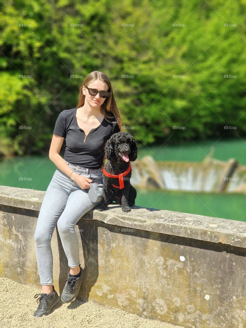 the young girl and her dog in a fairytale landscape