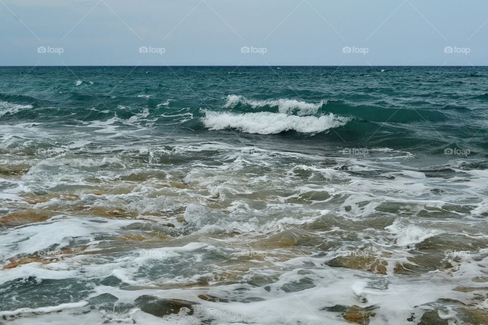 waves along rocky ocean shoreline