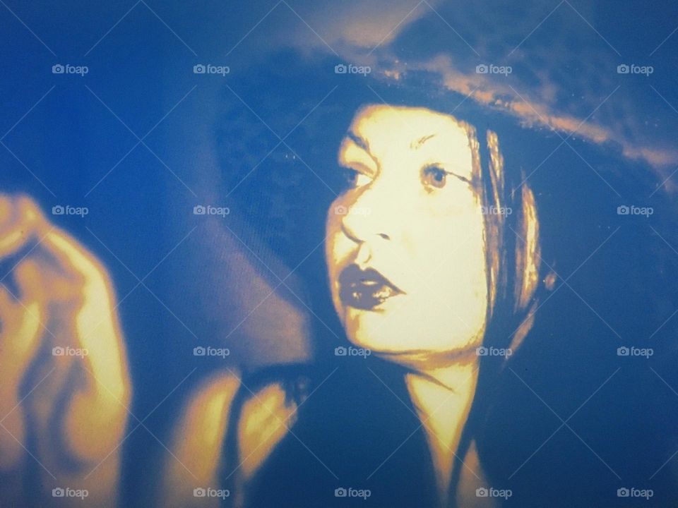 Selfie in a mirror with a hat