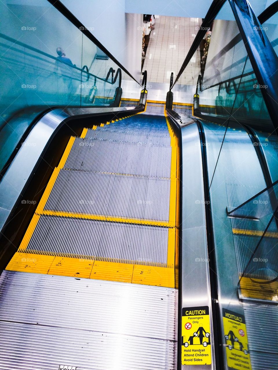 Down the up escalator