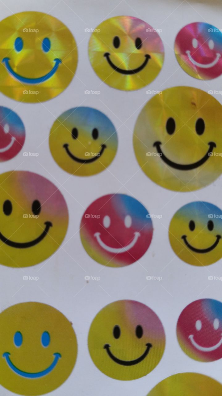 smileys.  multicolored smiling faces