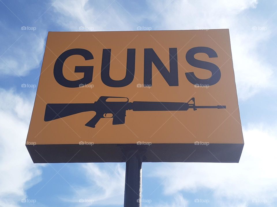 Guns Sign