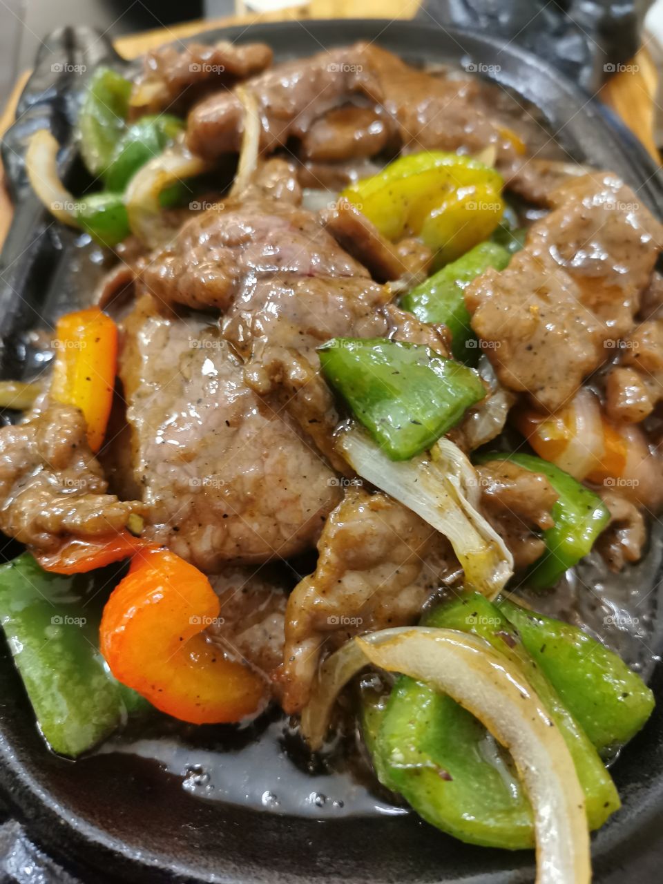 Beef, peppers and onion in black bean sauce.