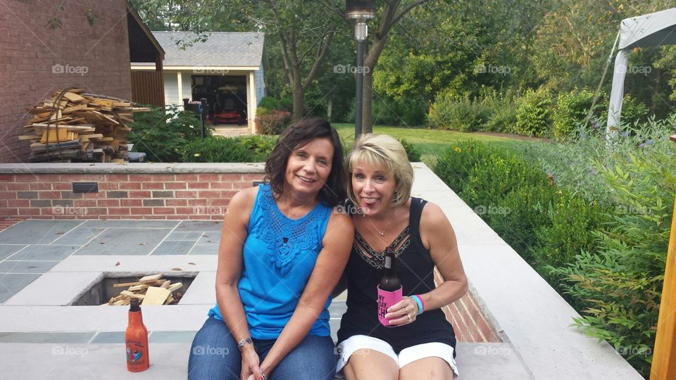 Two woman enjoying drink