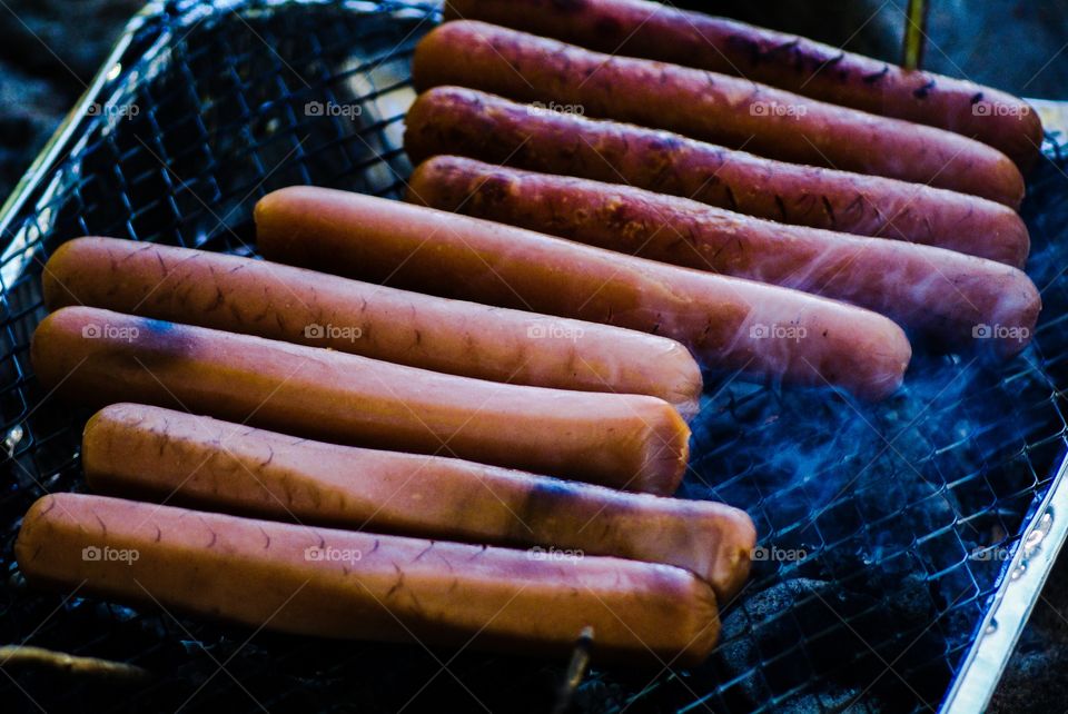 Hot dogs. Barbercue hot dog on a one time grill