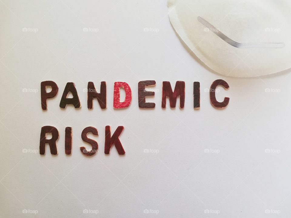 Written :"pandemic risk" and medical mask