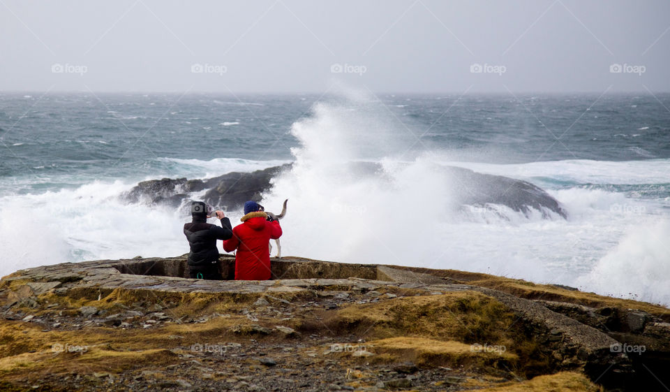 Couple in stormy weather. 