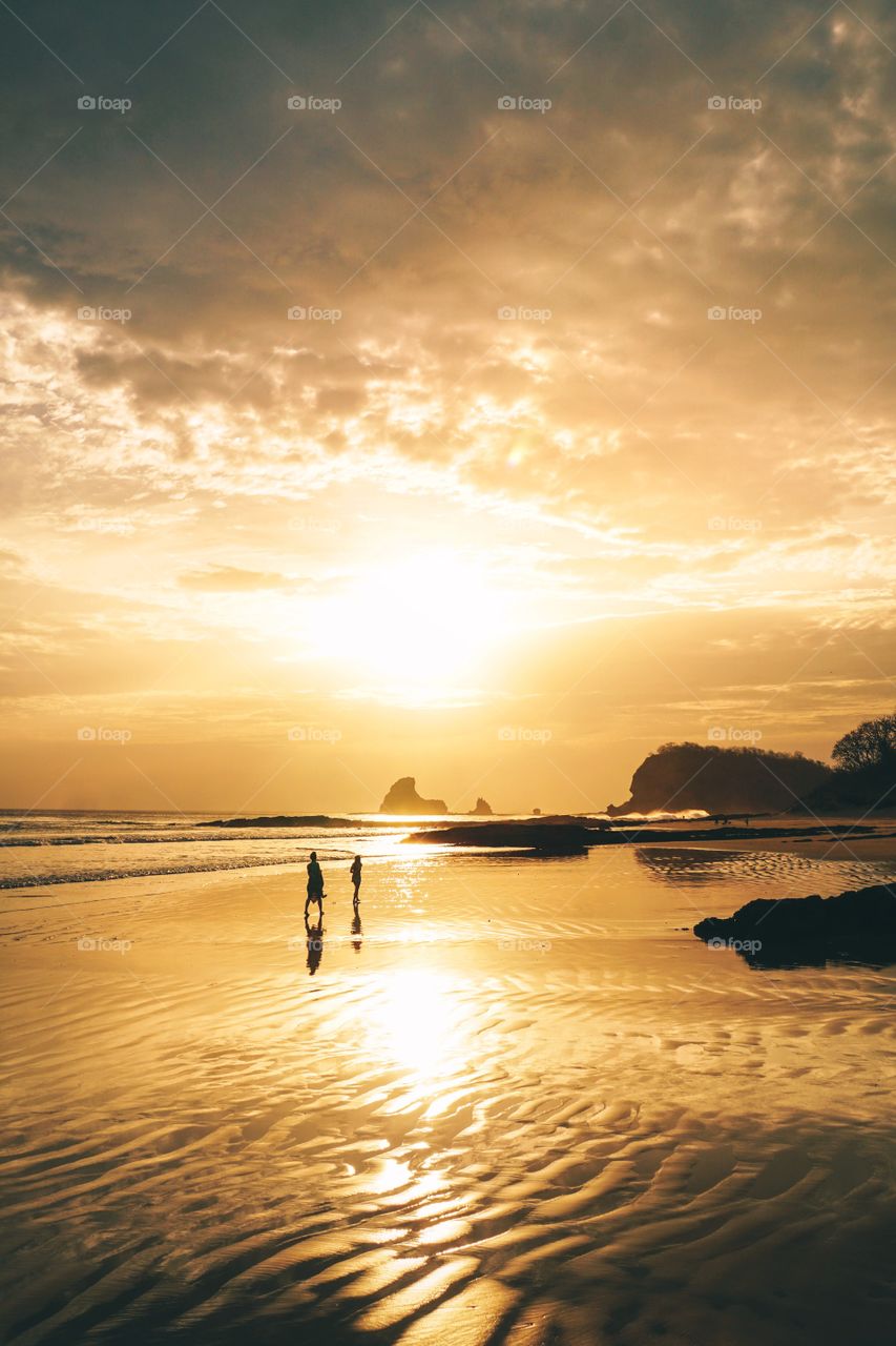 The pacific coast in Central America has the most impressive sunsets, but his one on a beach in Nicaragua was the most memorable one...the setting with that rock formation in the background and the reflection were just perfect