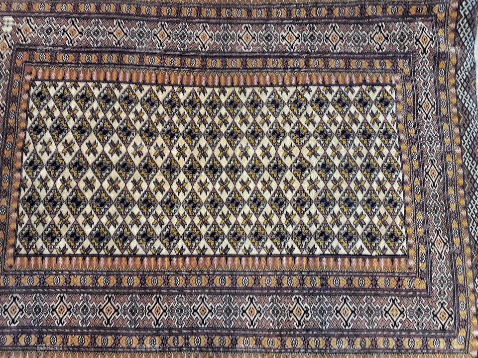 old Afghan wool carpet from a carpet bazar