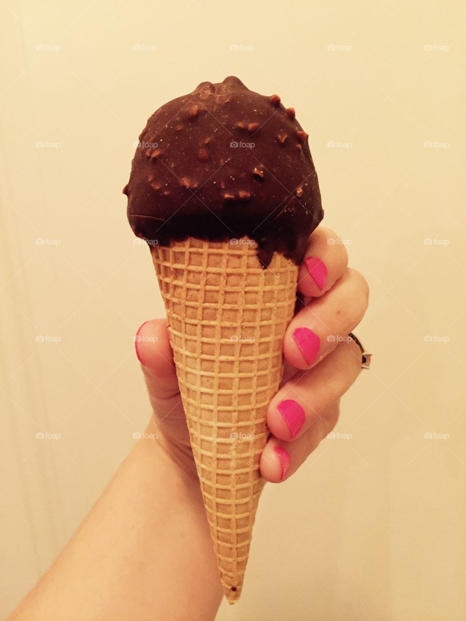 Hand holding ice cream. Ice cream cone 