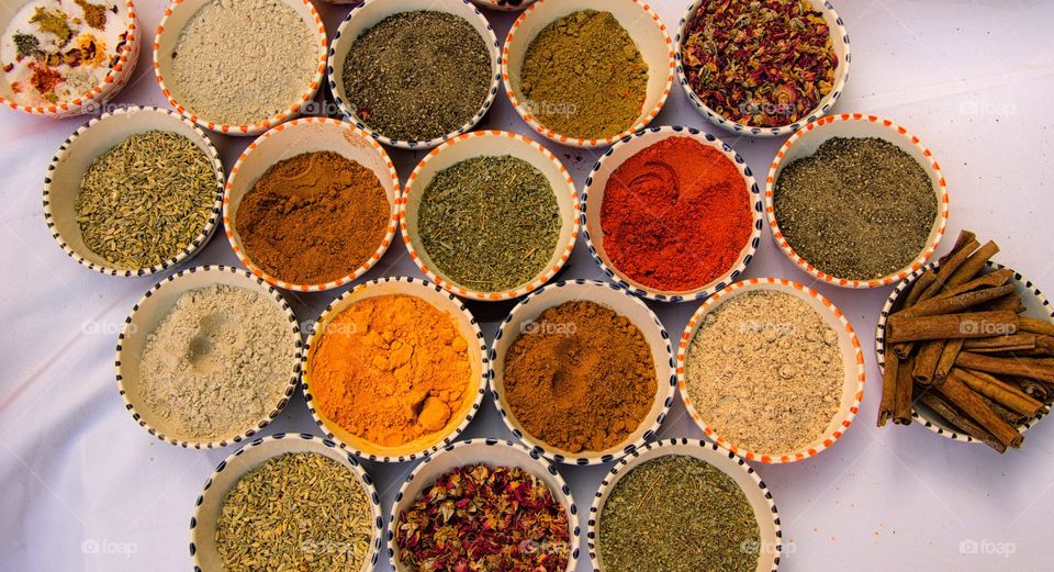 colorful bird eye view of spices containers