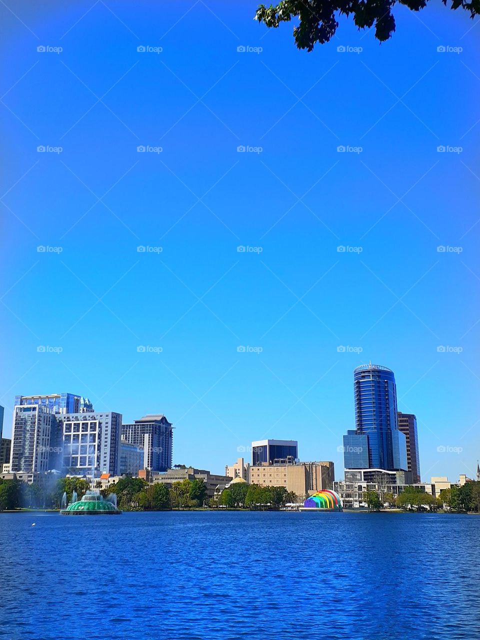 A beautiful cityscape and lakescape of Lake Eola in Orlando, Florida on March 26, 2022.