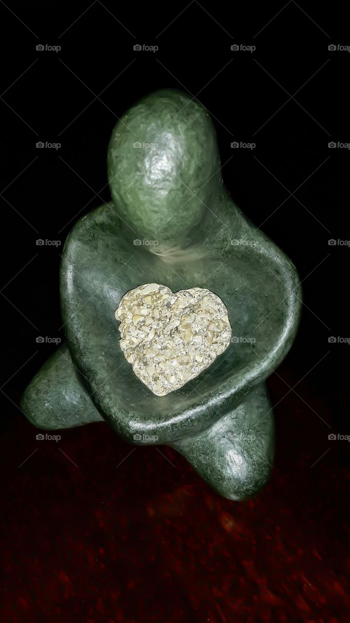 Buddha  holding a heart. Buddha heart & mind