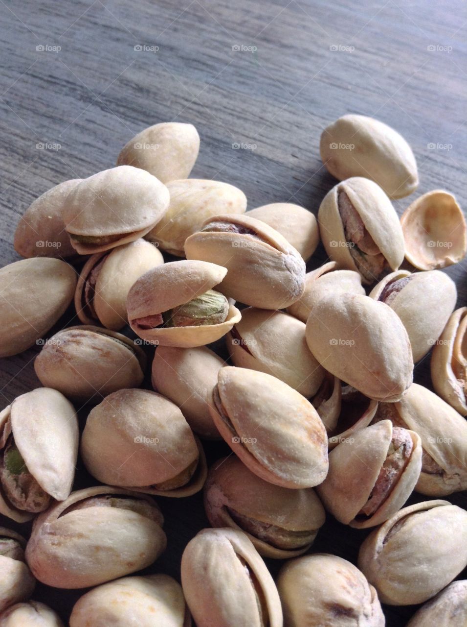 Pistachios as a healthy snack. Handful of pistachios