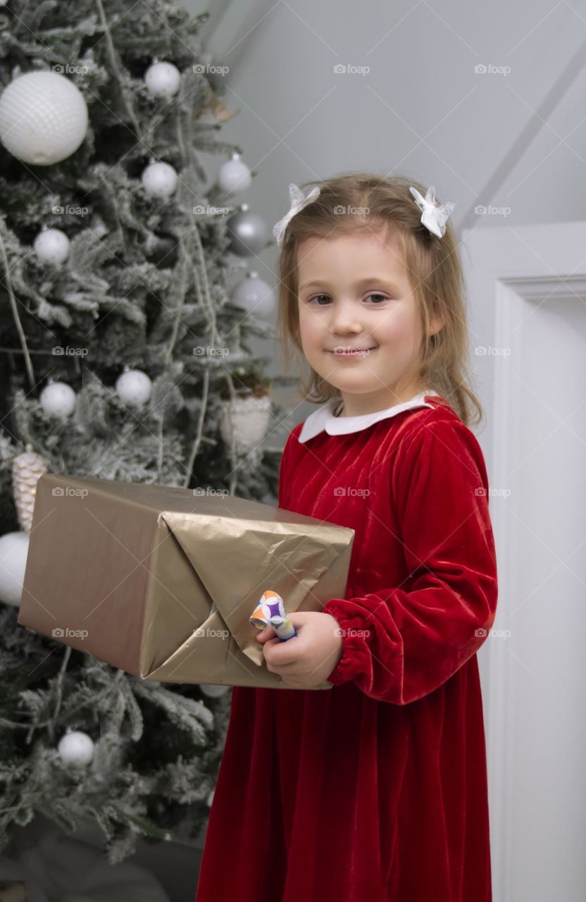 child holding a gift