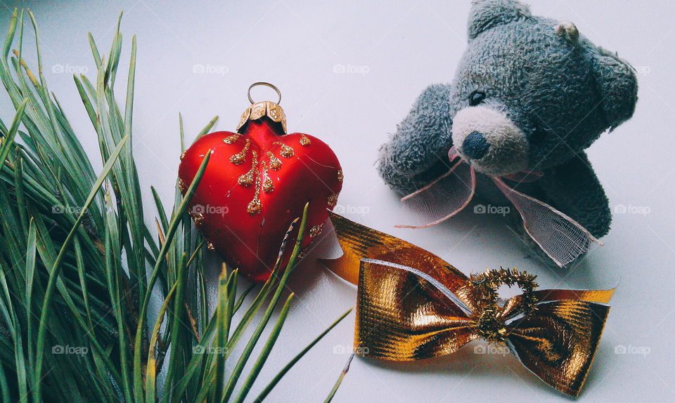 Christmas toys and a branch of pine