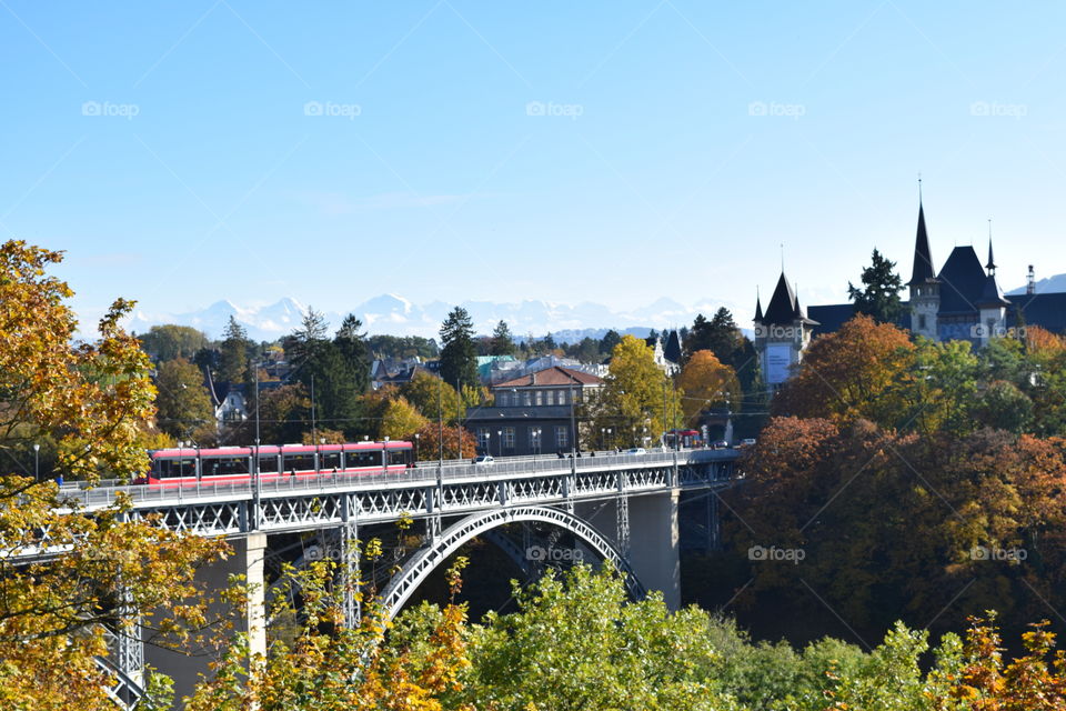 A tram rides over a bridge in Bern, Switzerland. October 2016.