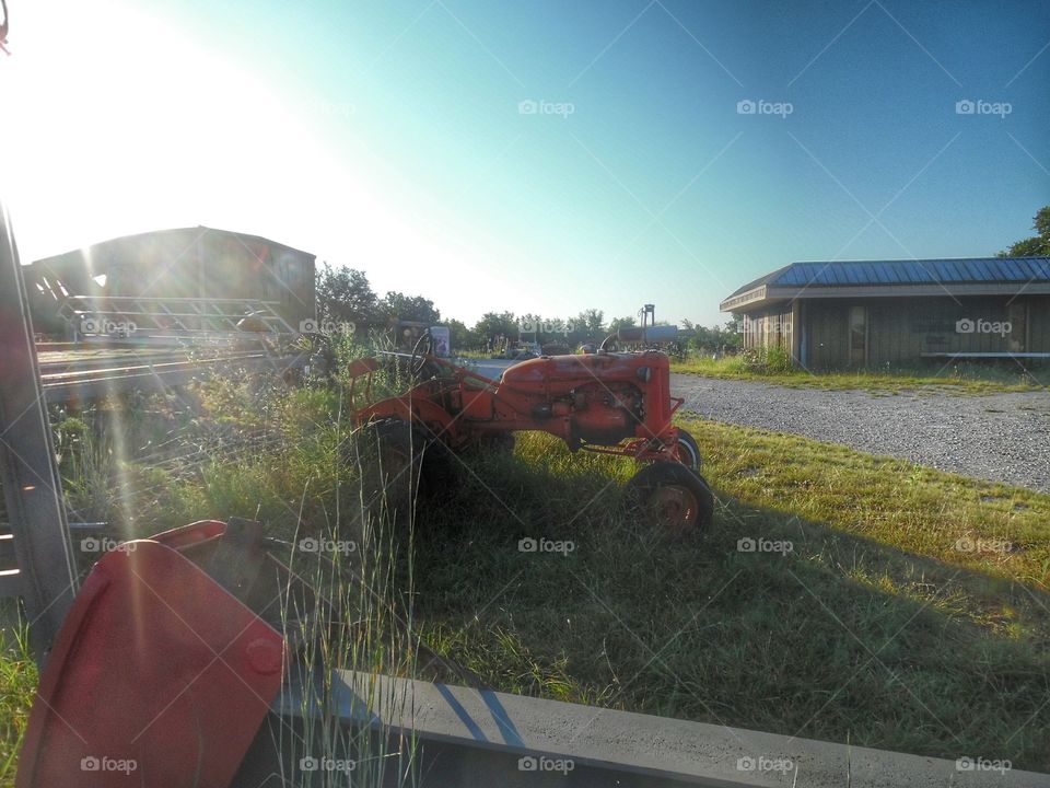 old tractor 🚜. This is a picture of a old tractor 🚜 that I saw while out riding my bike 🚲 this weekend