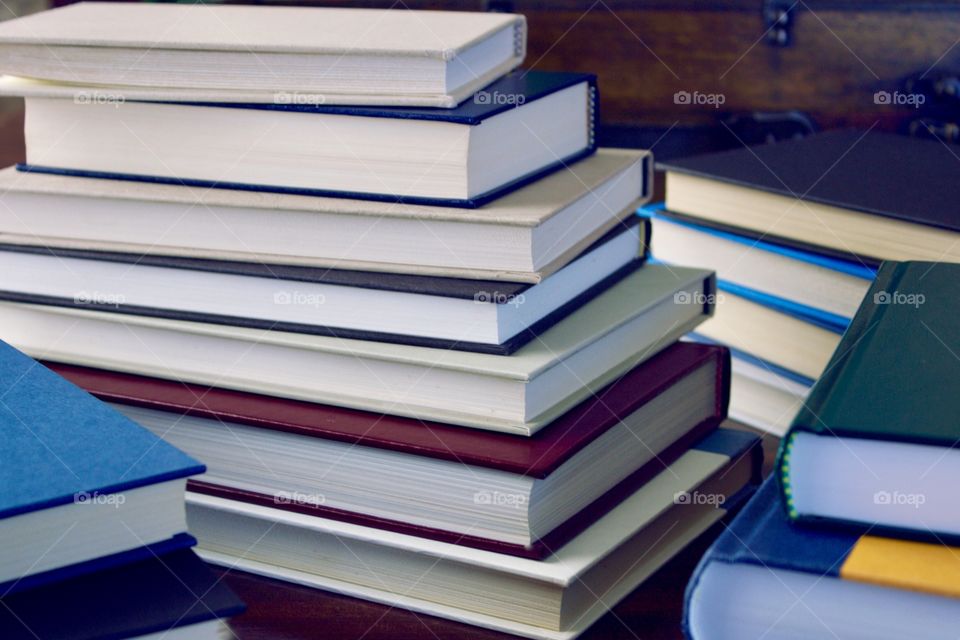Stacks of books with plain covers