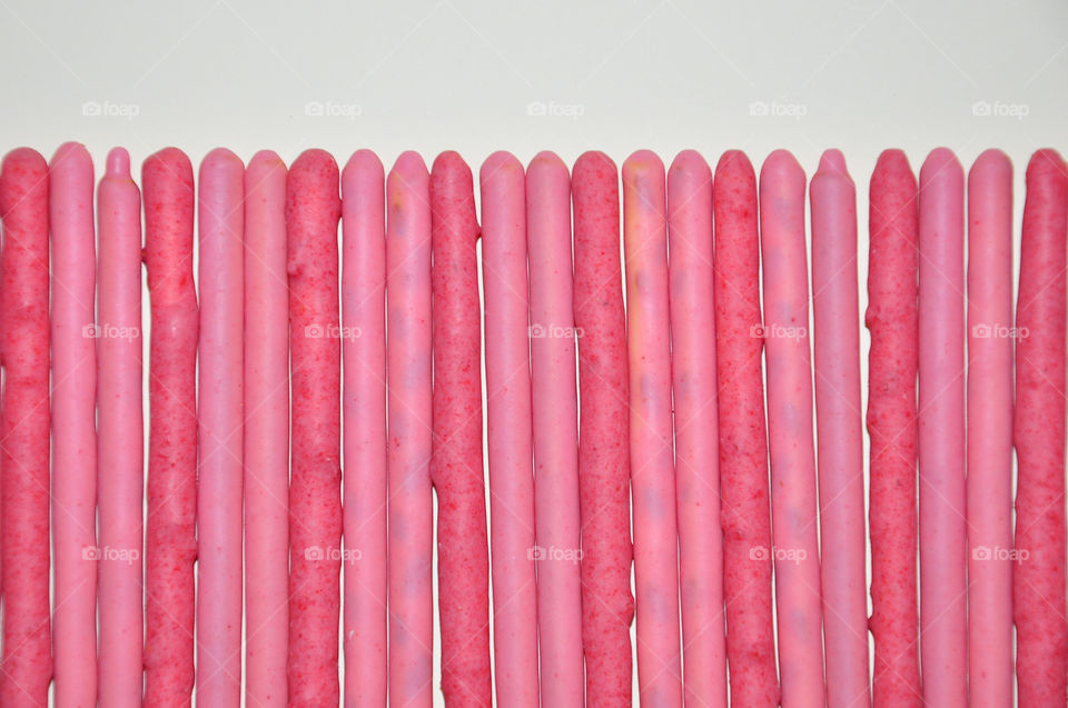 Strawberry cream covered biscuit sticks