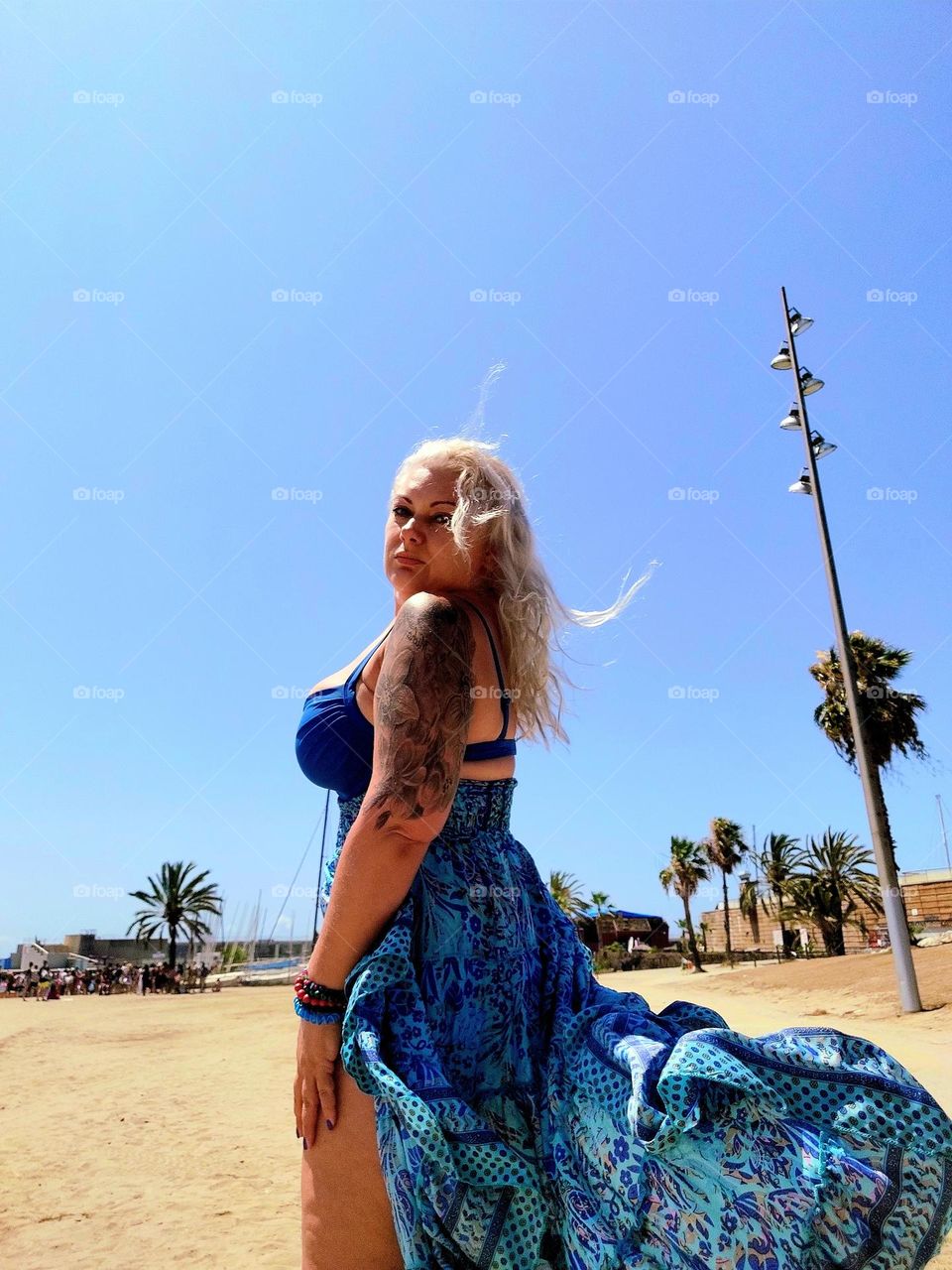 Woman in blue romantic on the beach