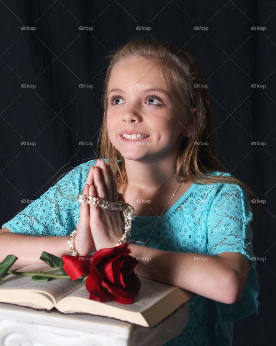 Portrait of a girl prying 