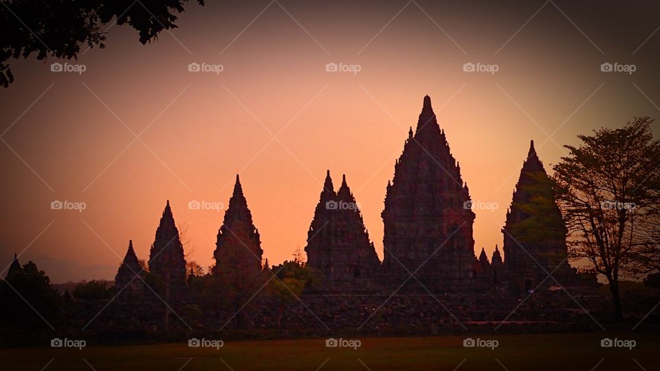 Sunset over Prambanan temple in Yogyakarta, Java, Indonesia - a summer night approaching on Java