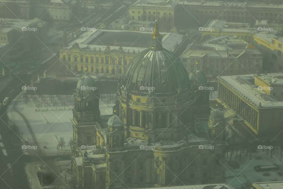 Aerial view of Berlin city covered with fog.