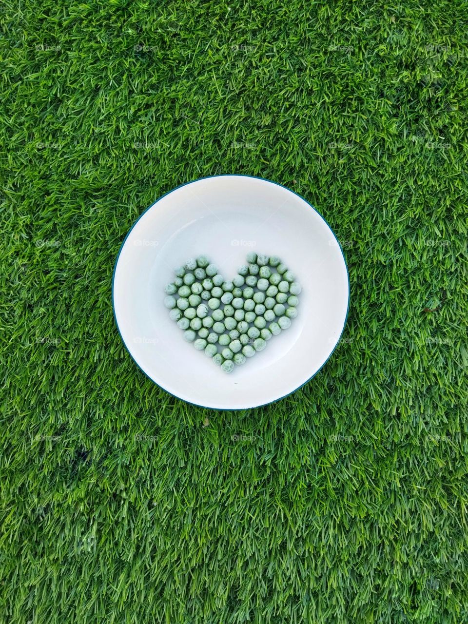 green love heart made from peas