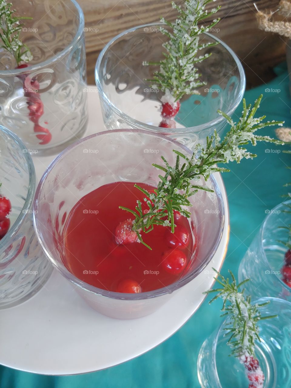 Christmas toddies with rosemary garnish