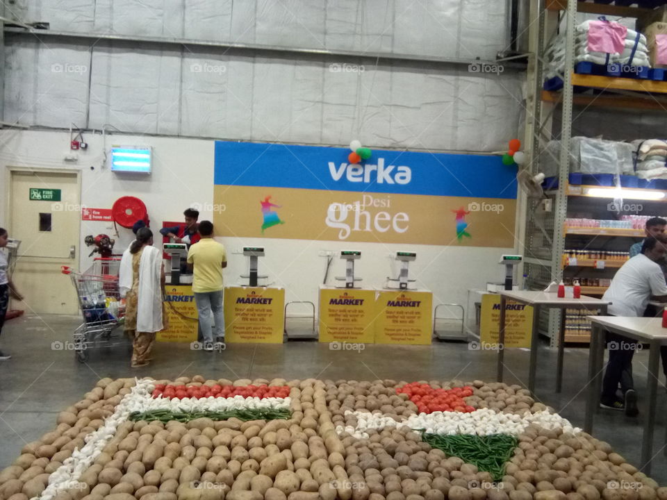 Beautiful Indian national Flag and plan made from vegetables.