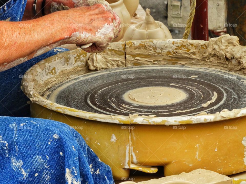 Hands Shaping Clay