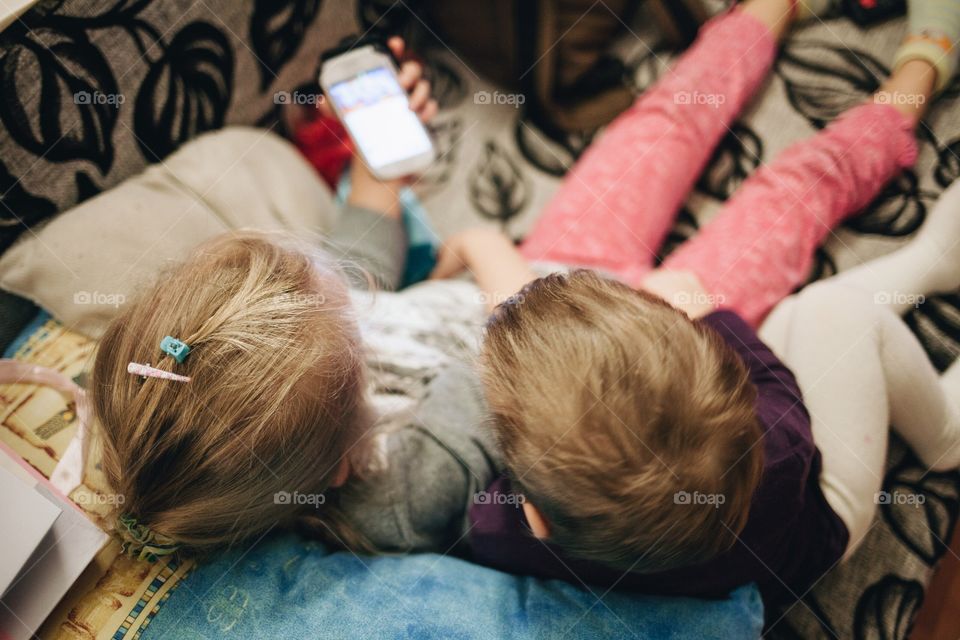 Kids using mobile 