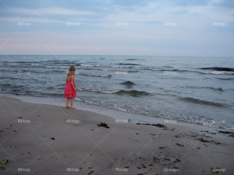 Granddaughter playing at the beach.