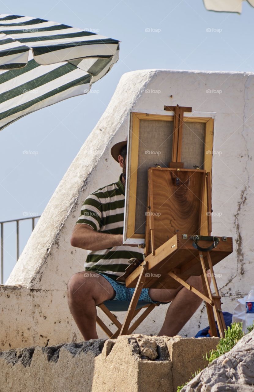 Painting by the seaside