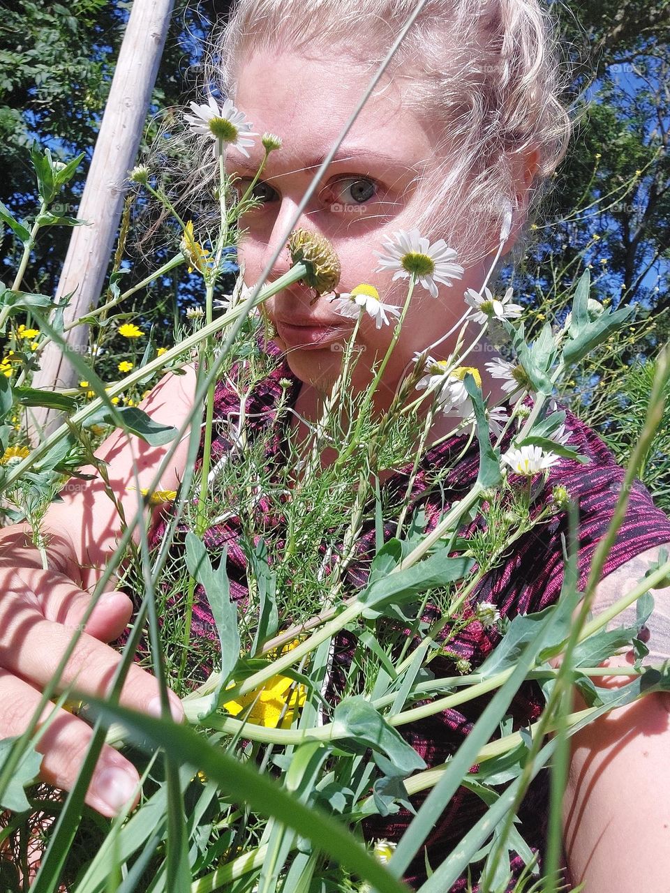 Wild flowers outside portrait