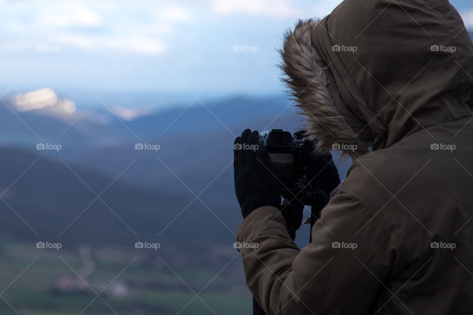 Girl takes photography to the landscape.