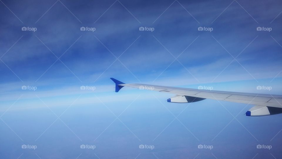 Aeroplane wing view from moving flight