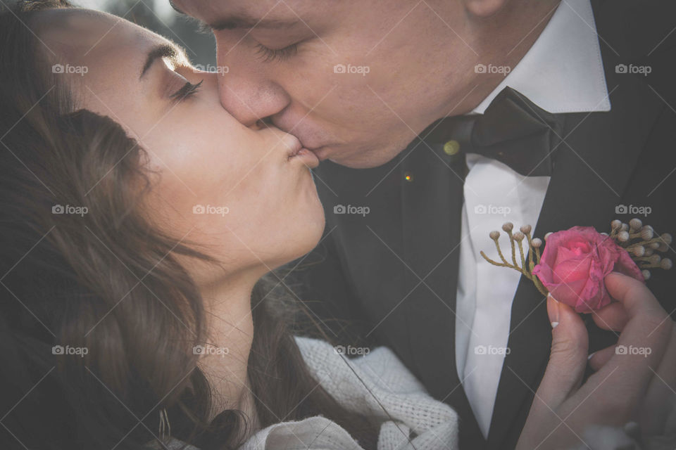 Close-up of a couple kissing