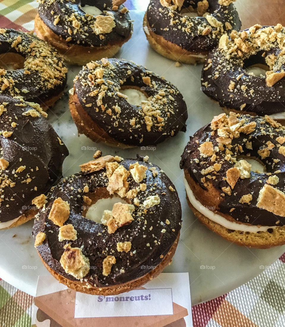 Mmmmm, donuts!  Homemade delicious donuts with chocolate , marshmallows and graham crackers.