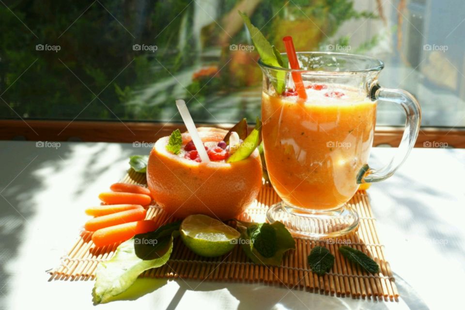 Fresh Fruit Smoothie -Jackfruit minty Smoothie - carrots,  grapefruit, mints   topped with raspberries