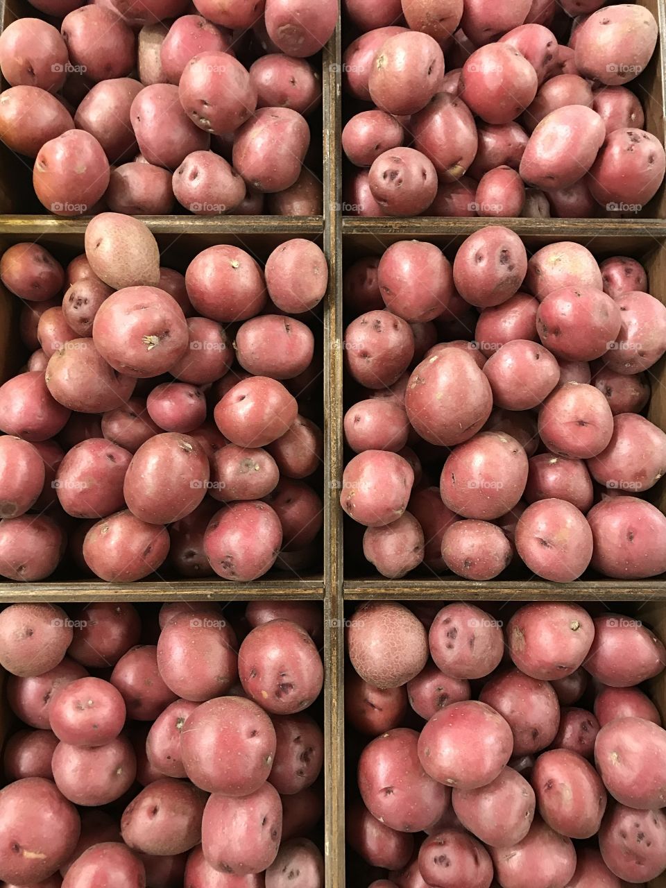 Red potatoes in shelf